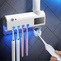 Suporte Dispensador Aplicador Pasta Escova de Dentes Esterilizador Com Luz UV Ante Bactérias.